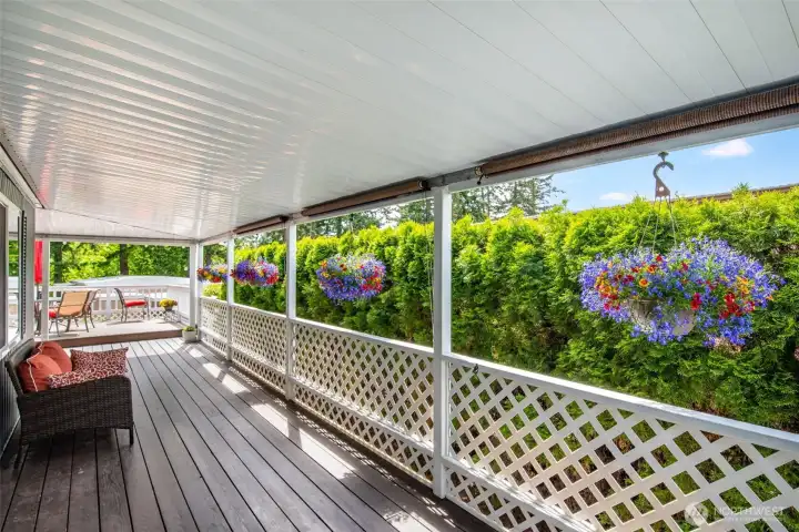 Private covered wraparound deck offers a peaceful outdoor retreat for relaxing, entertaining & enjoying the tranquil coastal setting year-round. Private covered wraparound deck offers a peaceful outdoor retreat for relaxing, entertaining & enjoying the tranquil coastal setting year-round.