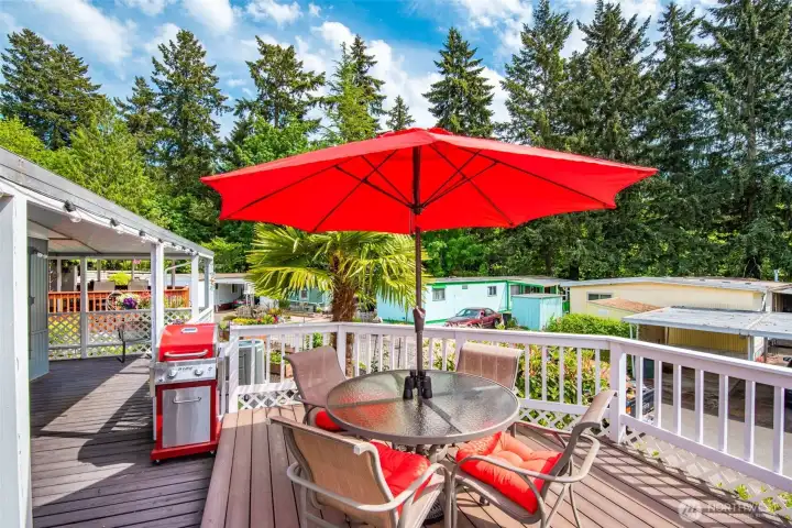Designed for indoor/outdoor living, the expansive deck is perfect for entertaining, dining al fresco or simply unwinding in the fresh coastal air. Designed for indoor/outdoor living, the expansive deck is perfect for entertaining, dining al fresco or simply unwinding in the fresh coastal air.