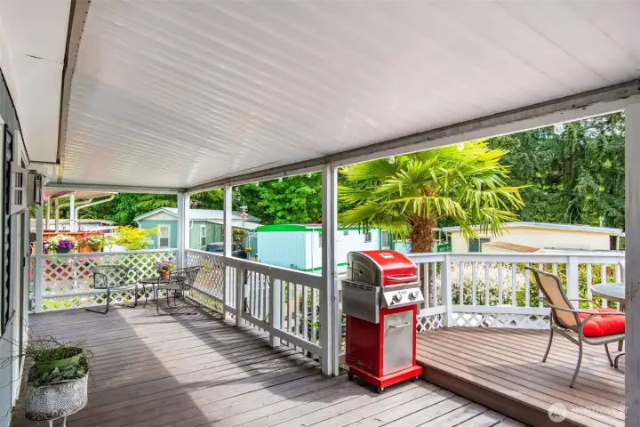 Covered deck spaces extend the living area outdoors, creating a private retreat for year-round enjoyment. Covered deck spaces extend the living area outdoors, creating a private retreat for year-round enjoyment.