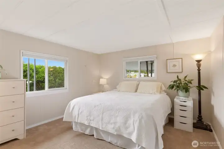 Spacious Owner’s Suite offers a peaceful retreat with soft natural light, neutral tones, and up-down blackout shades for added privacy and restful evenings. Spacious Owner’s Suite offers a peaceful retreat with soft natural light, neutral tones, and up-down blackout shades for added privacy and restful evenings.