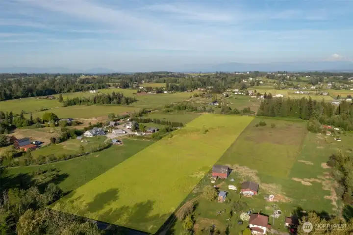 This 10 acre parcel is flat and mostly dry. Potential for hobby farm, equestrian, and/or your dream estate.