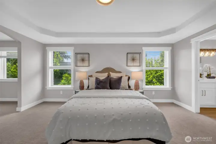 Elegant tray ceiling, new luxury carpet and fresh paint complete this stunning primary retreat. Elegant tray ceiling, new luxury carpet and fresh paint complete this stunning primary retreat.