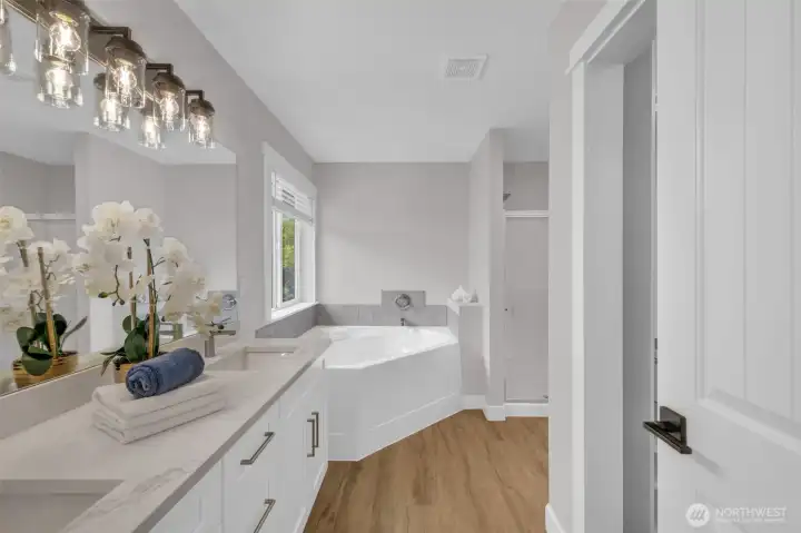 Primary bath with classic 5 piece tub, shower, separate toilet room, walk in closet and brand new double sink vanity Primary bath with classic 5 piece tub, shower, separate toilet room, walk in closet and brand new double sink vanity