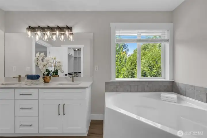 Primary bath with classic 5 piece tub, shower, separate toilet room, walk in closet and brand new double sink vanity Primary bath with classic 5 piece tub, shower, separate toilet room, walk in closet and brand new double sink vanity