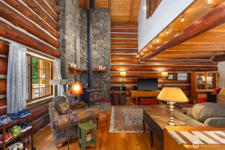 The first thing you'll notice is the 32' tall ceilings and gorgeous rock surround on the fireplace. The first thing you'll notice is the 32' tall ceilings and gorgeous rock surround on the fireplace.