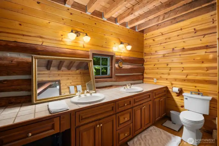 Bathroom connected to primary bedroom with walk-in shower. Bathroom connected to primary bedroom with walk-in shower.