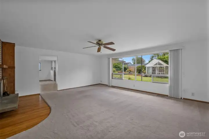 The Living room window looks onto the private backyard.