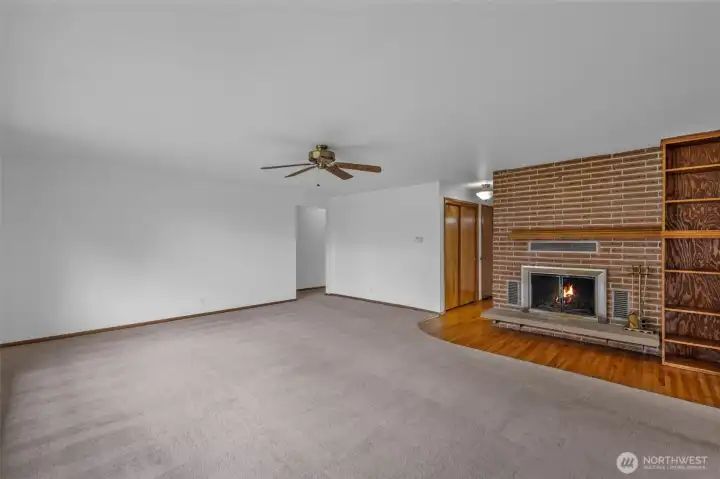 Enjoy the open space and the built-ins next to the fireplace