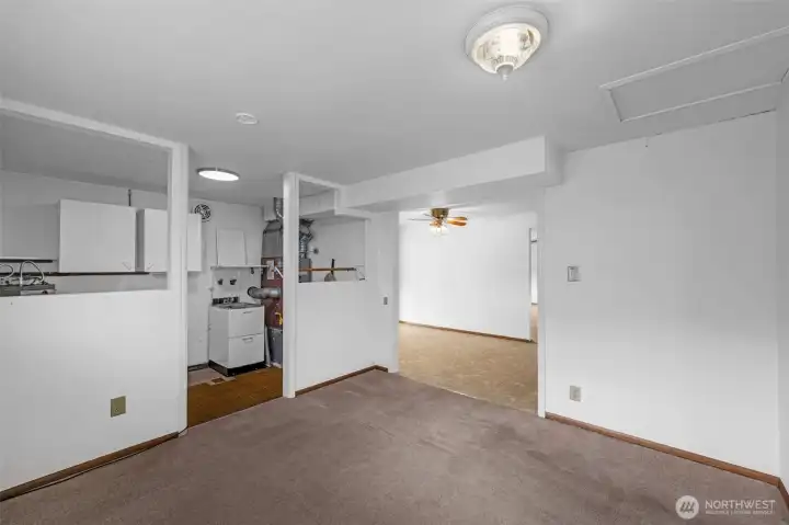 Family room or TV room with the utility room