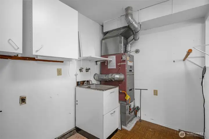 Gas furnace and electric water heater.