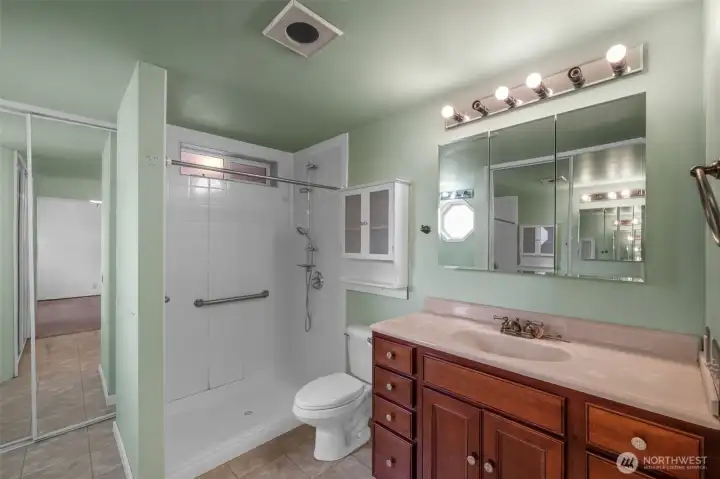 Large 3/4 bath off the primary bedroom with two closets