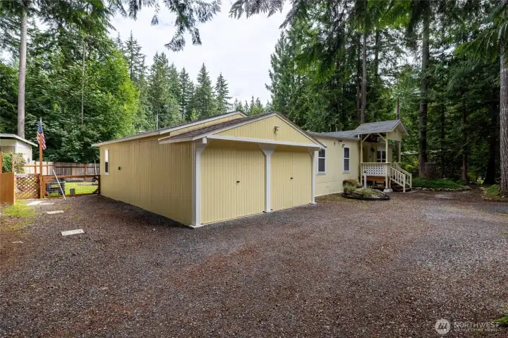 Double car garage/work area. Double car garage/work area.