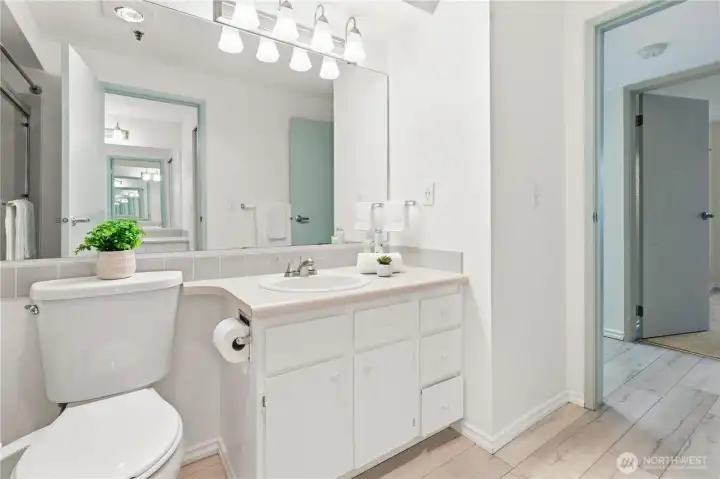 The Jack-n-Jill bathroom is accessible from the primary bedroom and hallway. The Jack-n-Jill bathroom is accessible from the primary bedroom and hallway.