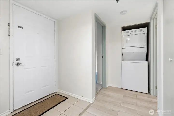 Off the front door entrance is the utility closet with your in-unit Washer/Dryer for optimal easy living. Off the front door entrance is the utility closet with your in-unit Washer/Dryer for optimal easy living.