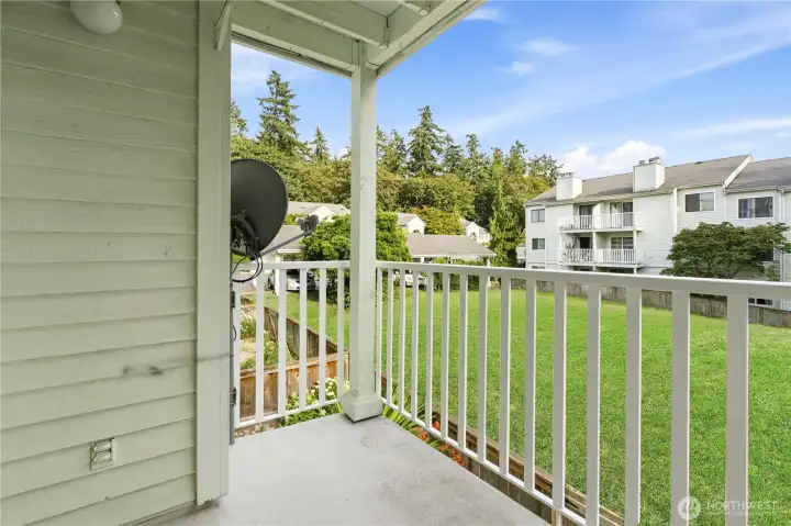Enjoy your morning cup of coffee or al fresco dining out on the balcony overlooking the peaceful open field. Enjoy your morning cup of coffee or al fresco dining out on the balcony overlooking the peaceful open field.
