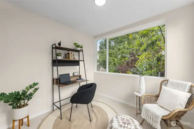 Work from home with a view! This sunlit flex space is the perfect setup for productivity—whether you’re tackling emails or sipping coffee with a good book. Bonus: That considerable window? It brings in all the natural inspiration you need!