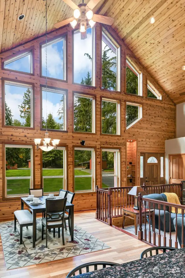 Light & bright interior with an abundance of windows and expansive ceiling.