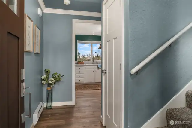 Looking though into the kitchen from the entry hallway.