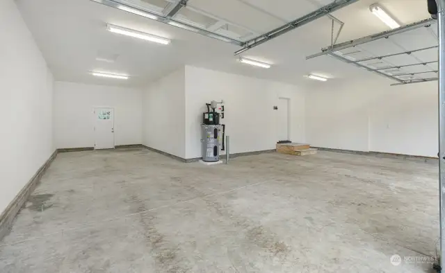 Four car garage with high efficiency hot water tank