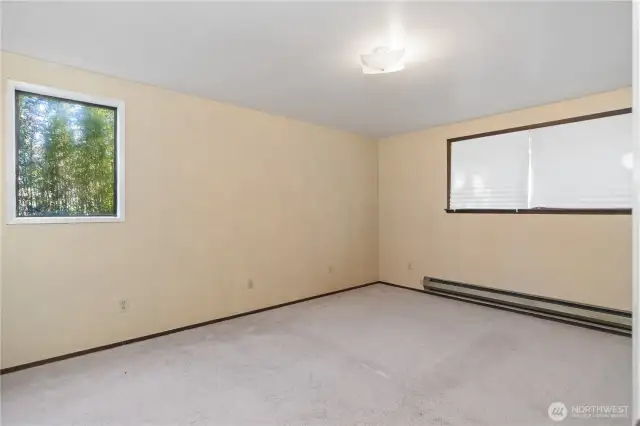 Large main bedroom with attached bathroom.