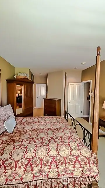 Primary suite looking towards closets & ensuite bathroom