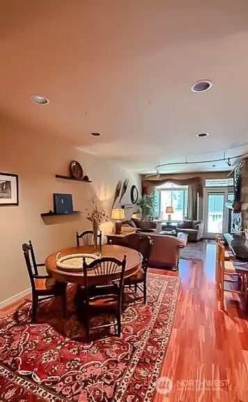 Open area layout. Hunter Douglas motorized blinds on window & French door