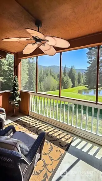 Screened in for year round enjoyment. Safety glass below railing keeps kids & pets out of trouyble