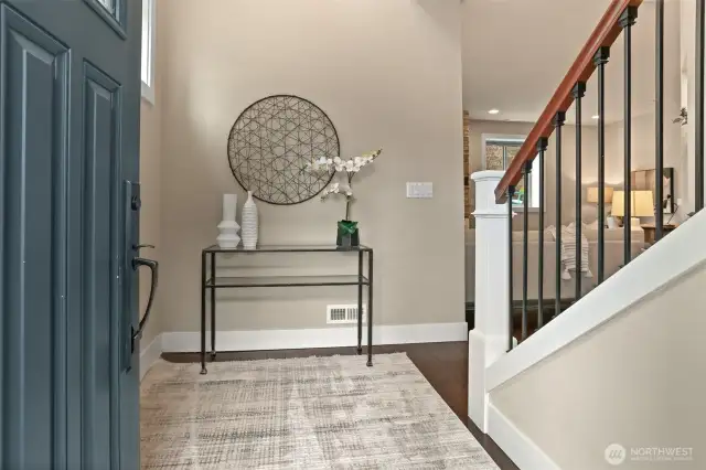 The entry has soaring ceilings and lots of light.