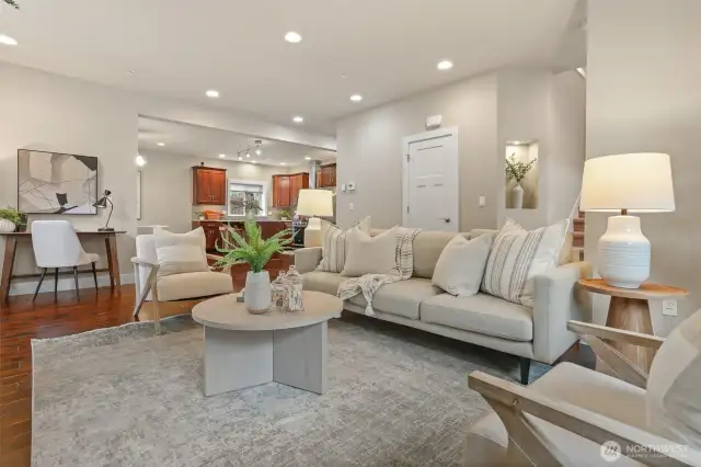 Lovely open concept living/dining/kitchen.  Soaring ceilings and engineered hardwoods.