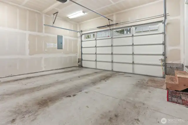 Huge two car garage with extra room for storage.