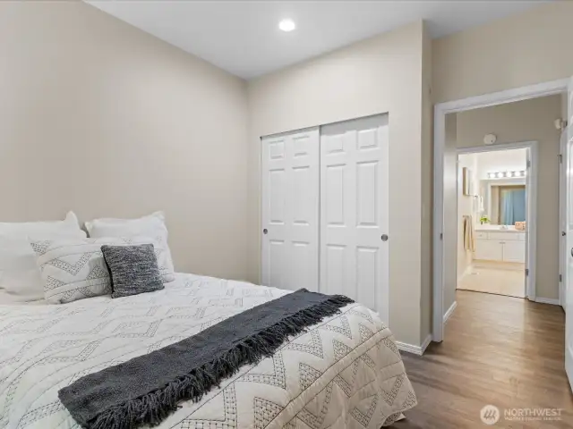 1st bedroom off hall, directly across from full bathroom.