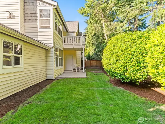 This unique corner unit offers one of only a few fully fenced private backyards - such a bonus!