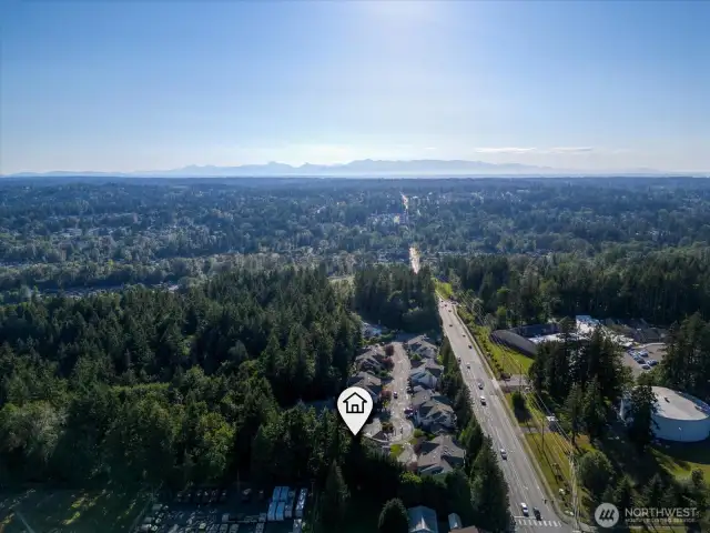 An overview of Canyon Ridge Condos looking west down 228th street towards the Olympic Mountains.