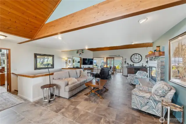 Spacious and open living spaces with views of Burrows Bay and the marina.