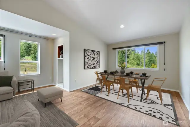 Every window in the home captures the beautiful territorial views, bringing the outdoors in. The open-concept layout offers versatility and generous space, perfect for entertaining family and friends.
