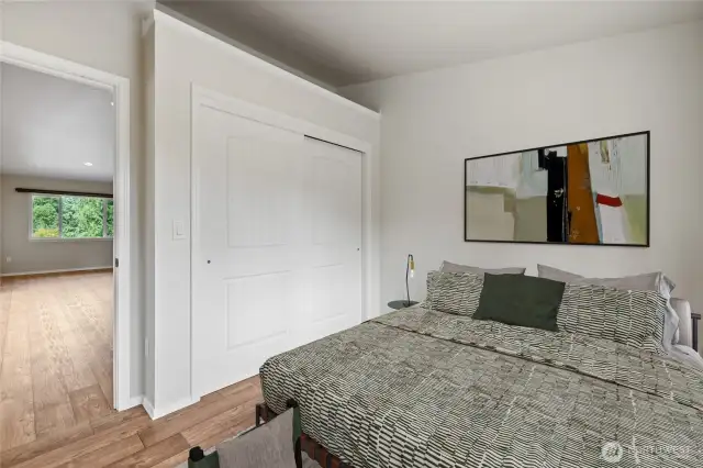 Bedroom #3 features a spacious closet and a large window that showcases beautiful territorial views.