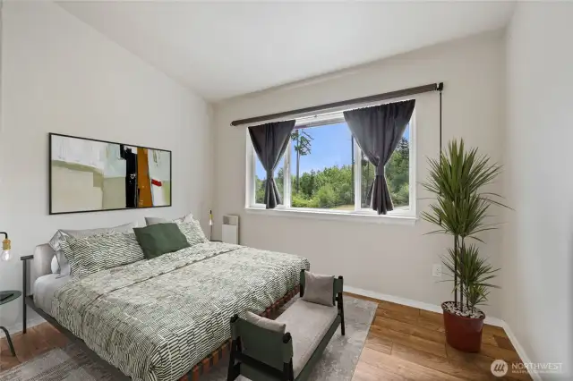 Bedroom #3 features a spacious closet and a large window that showcases beautiful territorial views.