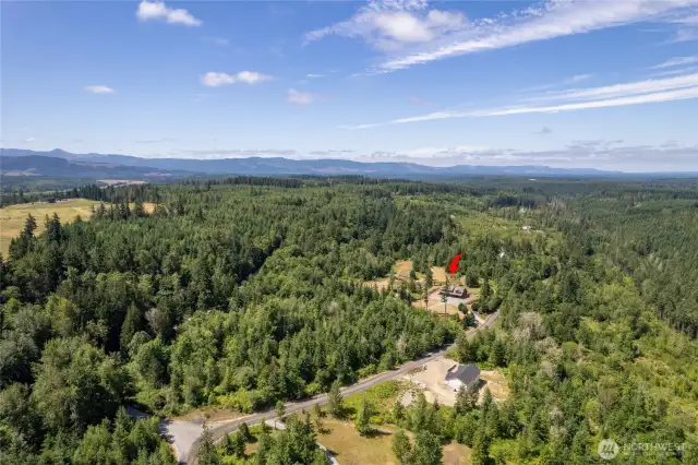 Set on 20.6 acres of land, this property offers ample space to explore, enjoy, and truly make your own private retreat.