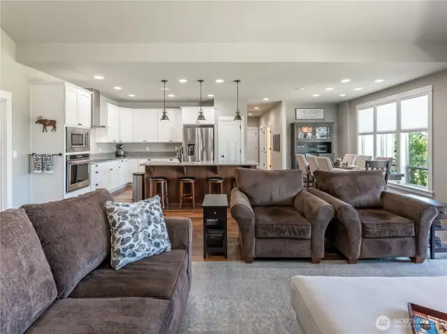 Great room is open to Kitchen and Dining