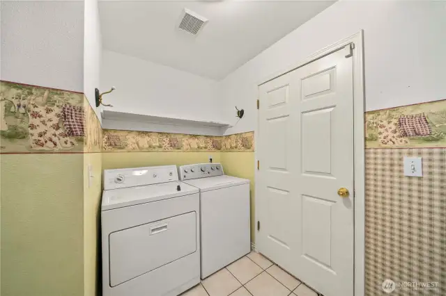 Main floor laundry/utility space off garage