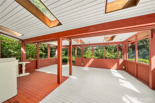 Rear covered porch with wrap around decking-adjacent to kitchen