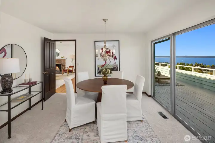 Dining table space with a glass door slider to the deck.
