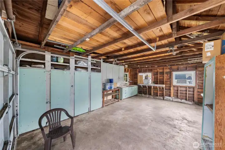 Here is the garage. It has built in storage, power and there is a sink, although I think water is turned off