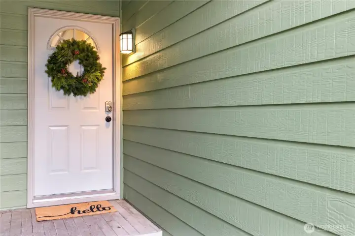 An inviting entrance welcomes visitors and you can also enter the home from the one car garage.