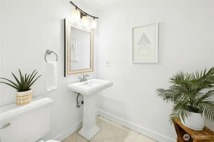 Main floor powder room just off the entry.