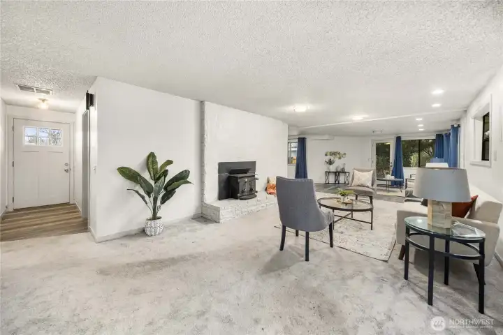 Entryway has a coat closet & notice the recessed lighting.