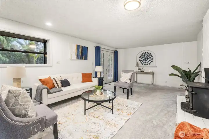 Living room has a garden window.