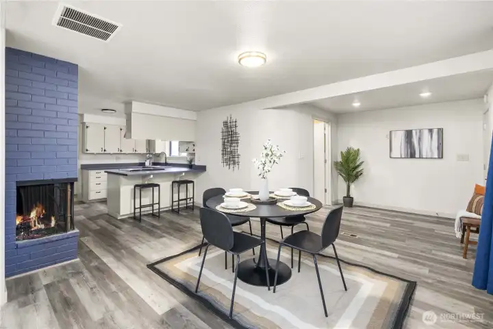 The 3/4 bathroom is located behind the curved wall.