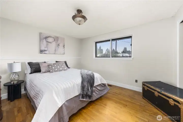 Main Bedroom with hardwood floors.