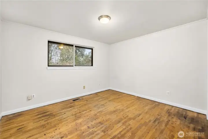 3rd bedroom with hardwood floors.